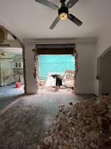 BEFORE: Connecting the living room with the outdoor courtyard would require making a bit of a mess.   Photo 2 of 25 in Before & After: In Buenos Aires, a Crumbling Home Gets a Major Refresh With a Rooftop Pool