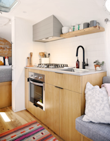 Kitchen of the Silver Armadillo Airstream by Rose Ballard Studio