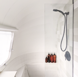“Everyone that visits is surprised at the size of our shower,” laughs Ballard. She and Suttles are both tall; they wanted to ensure they had elbow room and headspace so that showering was a pleasant experience. A glass partition helps make the bathroom feel roomier, allowing your eye to flow through the space. 
