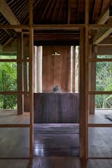The home and indigo plantation are located in the middle of nowhere, so the family enjoys extreme privacy from the neighbours… so much so, that the wood-encased bathtub is located out on the patio.