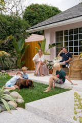 The Balsis family soaking up the sun on their terrazzo terrace.&nbsp;