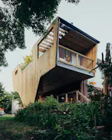 With balconies on every side, there are plenty of cozy spots to observe the nature in the park next door. 