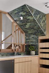 Kitchen, Subway Tile Backsplashe, and Wood Cabinet  Photo 4 of 13 in A Mother and Daughter Share an Expanded Weatherboard Cottage That’s Still Just 807 Square Feet