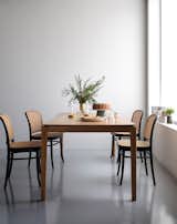 In terms of versatility, you can’t go wrong with a classic oak table—like the 79-inch Bok Dining Table from Ethnicraft.