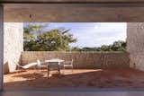 The perfect spot to bask in the sun before heading inside to the cool, concrete interiors. 