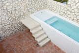 The tiles for the pool echo the ones used in the bathroom and kitchen. 