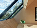 The self-sufficient residence operates
entirely on solar power and includes an incinerating toilet and a rainwater collection and filtration system.
