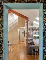 Hygge and West’s Alpine Garden wallpaper in Ebony adds pattern and personality to the entryway—not a bad first impression.