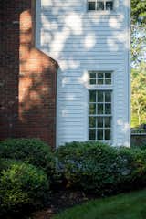 A primary concern for the homeowners was ensuring the siding would last the lifetime of the home.  Photo 6 of 7 in A Colonial-Style Home Gets a Second Life Without Losing Its Charm