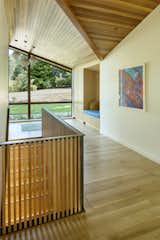 Between the white-oak flooring and mixed-grain cedar ceiling planks, you'll find clean white drywall—a pleasing visual break from all the wood.