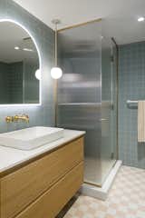 CESI Full Body tiles in Ossido cover the walls while a checkered pattern of Agata and Sodio tiles defines the floor. 