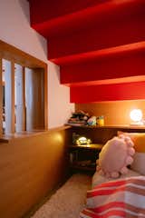 A cozy moment for the kids under the steps. 