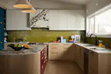 The sconces above the window are from Luminaire Authentik.