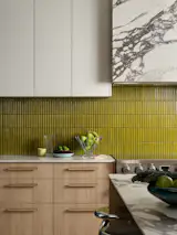 The wood handles were hand-stained and sealed to match the cabinetry wood. 
