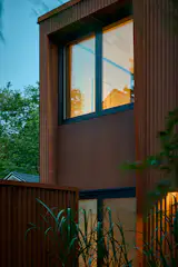 The Corten exterior will continue developing its rusted patina over time, requiring no maintenance.