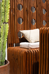 This custom ensemble provides seating for the exterior dining table. Similar to the corner bench, there is storage within the bench and easy access to the outlets behind. 