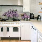 The heart of our home, the kitchen. Fresh flowers are always scattered through out the home.