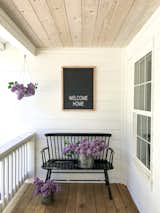 The covered porch by the front door.