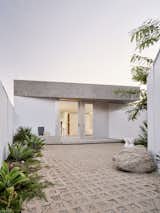 Making this walkway for the renters to feel entering to their own place by designing a gravel path and gate with a front garden. Besides the ADU is located further inside from the street, the view of the street beyond from the new house is much deeper and enjoyable.