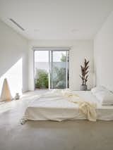 Bedroom, Bed, Concrete Floor, and Recessed Lighting  Photo 12 of 19 in ADU : RE-THINK by Yeh-Yeh-Yeh Architects