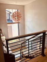 Modern lighting against craftsman window