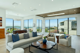 The open layout maximizes natural light and creates a seamless flow between indoor and outdoor spaces.