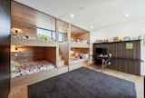 A spiffy bunk room with space to play will accommodate four, or eight, and is sure to delight the youngsters.