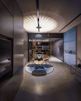 Living Room, Chair, Table, Ceiling Lighting, and Ceramic Tile Floor  Photo 1 of 22 in Copper Cube Haus by DIG Architects