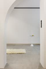 Hallway and Concrete Floor Entry Vestibule  Photo 14 of 15 in Lycabettus Studio Apartment by SOUTH architecture