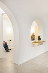 Hallway and Concrete Floor Arched Partition  Photo 10 of 15 in Lycabettus Studio Apartment by SOUTH architecture