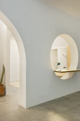 Hallway and Concrete Floor Arched Partition  Photo 6 of 15 in Lycabettus Studio Apartment by SOUTH architecture