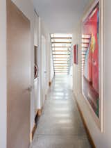 HALLWAY FROM GARAGE VIEW THRU STAIRCASE