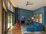 The Living Area looking is designed with dark cool tones, to contrast with the views to the bright exterior. The palette was built around the peacock blue couch, an impulse purchase that begat the rug selection and ultimately the entire palette.