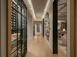 Hallway and Light Hardwood Floor Wine Cellar   Photo 17 of 19 in Mountain Shadows by Catalano Architects
