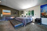 Expansive top floor primary bedroom en-suite with sun deck and a great work-from-home space.