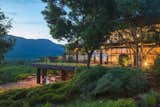 The backside view, facing the wooded mountains.