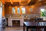 Dining room table and door to accessible deck with views of Puget Sound and Olympic Mountains