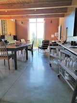 Dishes and glasses are on moveable racks to make it easier for everyone to set the table or unload the dishwasher.