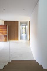 Hallway and Travertine Floor  Photo 9 of 16 in House R by Jakub Kolarovič Architects
