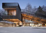 In winter, the bones of the house (laminated beams supporting cross-laminated timber panels) are visible. 