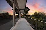 Outdoor balcony showcasing commanding views of the San Fernando Valley and Santa Susana’s.
  Photo 5 of 9 in “Queen of The Hill” Incredible Post and Beam MCM w commanding Valley Views by Alan Taylor