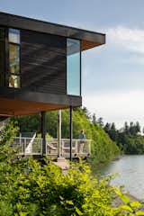 Outdoor, Woodland, and Shrubs  Photos from A Waterfront Home in Washington Grows Two Hovering Wings