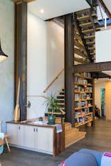 Custom stair tower with 3 story tall bookcase