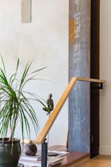 Custom railing with exposed steel framing