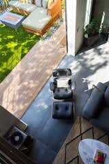 Landscaping by Zack Freedman, living room floors are 24" square porcelain tiles