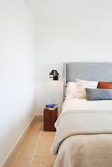 Bedroom, Bed, Night Stands, Wall Lighting, and Ceramic Tile Floor Guest bedroom  Photo 8 of 14 in H House by STUDIO OCRA
