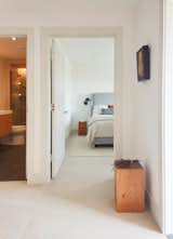 Bedroom, Night Stands, Bed, Ceiling Lighting, and Ceramic Tile Floor Entry  Photo 9 of 14 in H House by STUDIO OCRA
