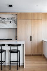 The natural oak is enhanced by the light coming from the side window. 
