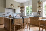 Kitchen, Range, Quartzite Counter, Marble Counter, Pendant Lighting, Light Hardwood Floor, Undermount Sink, Wood Cabinet, and Colorful Cabinet  Photo 6 of 18 in So Rad in Carlsbad by Katie Betyar