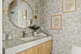 LaMarque assembled a rich palette of materials to create a luxurious bathroom. 